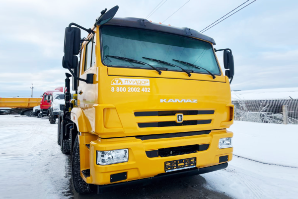 Седельный тягач КАМАЗ 65116 с КМУ